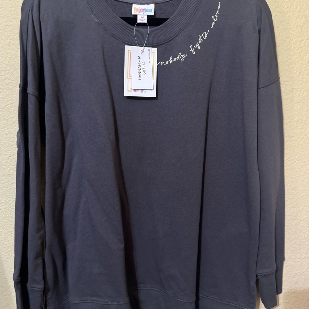 Lularoe Hannah sweatshirt, black with BCA ribbon “Nobody fights alone”